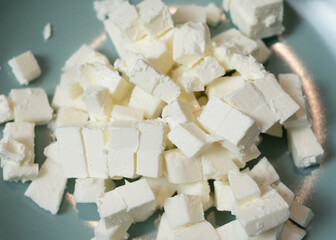 Feta cheese cubes in plate