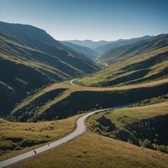 Fototapeta premium A lone bird flying over a mountain pass, with clear skies and rolling hills below.