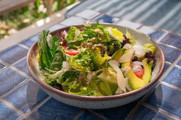 Fresh vegetables salad with tomato and sauce