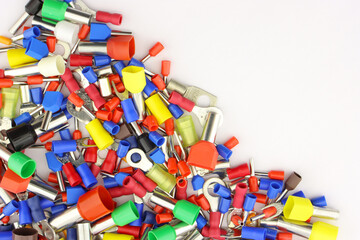 Copper pin colored insulated tips. Close-up. Soft focus.