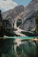 People on the lake Pragser Wildsee, Lake Prags, Lake Braies. Natural lake in the Prags Dolomites in South Tyrol, Italy 