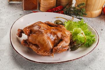 Baked small chicken with spices