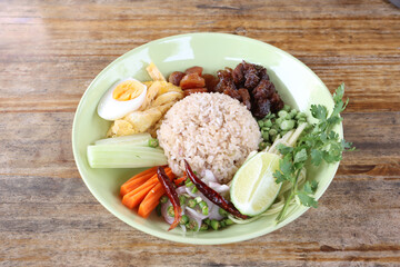 Khao kluk kapi. Rice mixed with shrimp paste. Thai shrimp paste fried rice with sweet pork and assorted