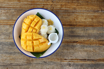 Mango sticky rice is a traditional Southeast Asian and South Asian dessert made with glutinous rice, fresh mango and coconut milk