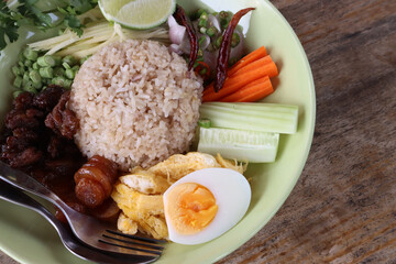 Khao kluk kapi. Rice mixed with shrimp paste. Thai shrimp paste fried rice with sweet pork and assorted