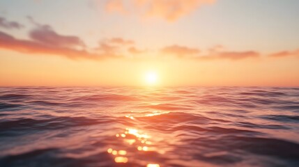 Fototapeta premium Golden Sunset Over Calm Ocean Waves