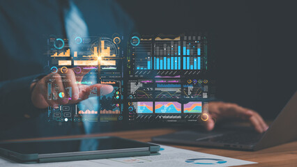 Professional analyzing dynamic data visualizations, interactive graphs and charts represents advanced business analytics, emphasizing importance of data-driven decision-making in modern organizations