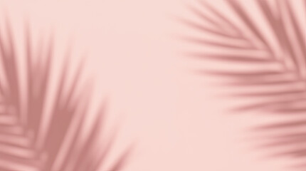 Abstract minimalist background with soft shadows of palm leaves on a pastel pink surface. Elegant and stylish design suitable for the beauty industry, branding, social networks, cosmetics advertising.