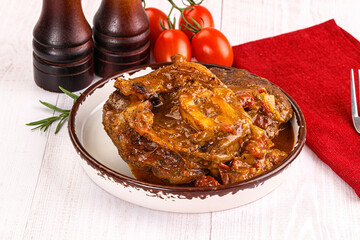 Italian cuisine - ossobuco with sauce