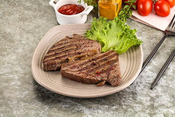Delicus grilled beef steak with sauce