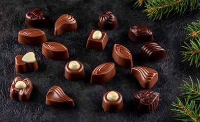 chocolate candies on dark background