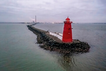 Aerial photography of Poolbeg lighthouse and the Great South Wall early in the morning