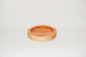 Wooden Plate isolated on white background with a 45 degree angle setup