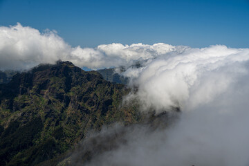 Clouds in the mountains. Clouds frozen between the mountains. Landscape. Madeira Island