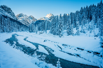 Ice Dawn in Sappada. Walk through ancient villages and dream mountains. Dolomites.