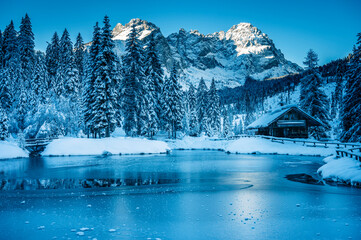 Ice Dawn in Sappada. Walk through ancient villages and dream mountains. Dolomites.