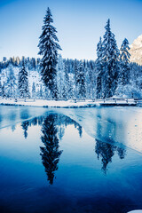 Ice Dawn in Sappada. Walk through ancient villages and dream mountains. Dolomites.
