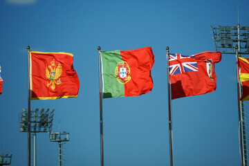 Portuguese and international flags fluttering in the stadium