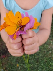 girl holding a flower