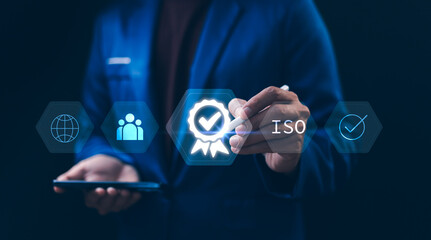 Quality control Businessman touch on ISO  sign or tick mark with document icon for approve quality...