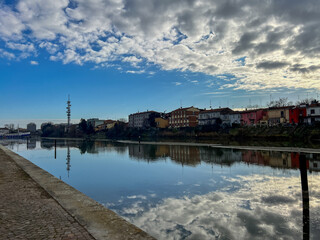 Ferrara waterway and navigable canal in Ferrara at sunset