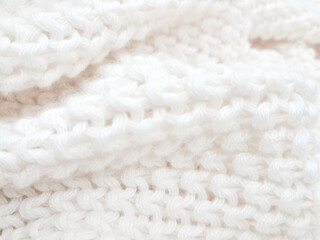 An artistic white knitted plaid background, combining texture and modern minimalist style.