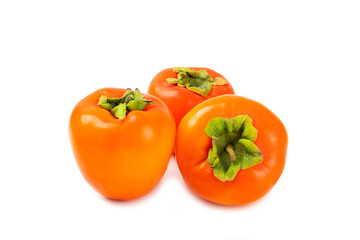 Persimmon isolated on white background. Persimmon fruit. Slice of ripe, juicy, sweet persimmon fruit. Vegan. Fruit garden. Close-up.
