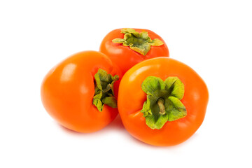 Persimmon isolated on white background. Persimmon fruit. Slice of ripe, juicy, sweet persimmon fruit. Vegan. Fruit garden. Close-up.