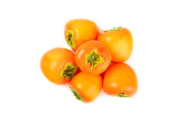 Persimmon isolated on white background. Persimmon fruit. Slice of ripe, juicy, sweet persimmon fruit. Vegan. Fruit garden. Close-up.