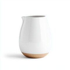 Elegant white ceramic pitcher with wooden base on a white isolated background.
