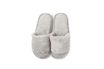 Soft slippers isolated on white background. Home slippers. Comfortable shoes for home. Foot care concept. Home comfort. Space for text. Copy space.