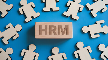 Obraz premium HRM: Human Resources Management, Employee Engagement, Recruitment, and Organizational Growth, human resources management concept. Wooden figures on the blue background, hrm copy space, hrm background