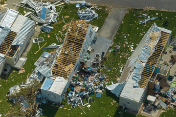 Destroyed by hurricane Ian suburban houses in Florida mobile home residential area. Consequences of...