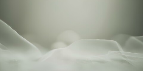 Obraz premium Soft white silk fabric with satin texture and subtle lines, perfect for a wedding or winter-themed decoration, featuring a close-up macro shot of the textile's light and smooth pattern