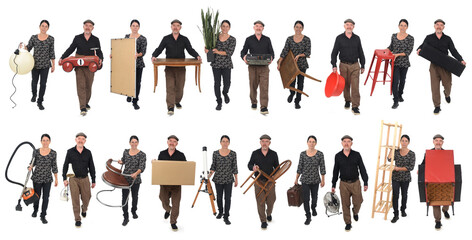  front view of the same woman and same man walking carrying various objects from his house, house moving concept