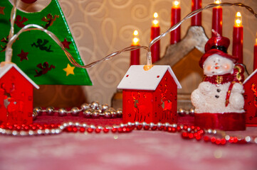 Christmas lights. December holiday in winter town. Home Christmas decoration. Garland decoration...