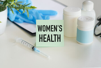 Lettering card Women's Health with syringe, pills and flower pot