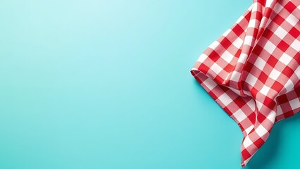 Fabric cloth or placemat on wood table top on blue pastel