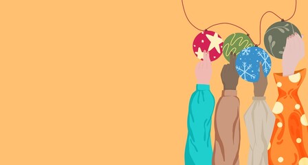 Hand holding Christmas accessories ready to decorate