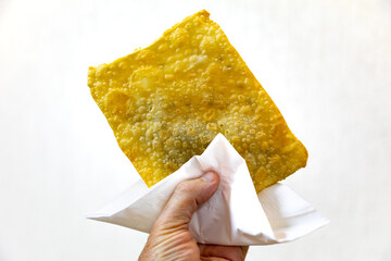 Traditional Brazilian fried pastry stuffed with ground beef. 