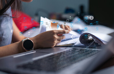Close-up of a person working with documents and a laptop, overlaid with futuristic digital data analysis and workflow graphics.