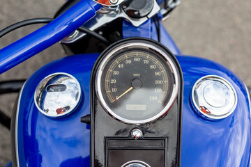 Motorcycle speedometer on the tank with chrome details