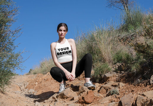 Mockup Of Woman Wearing Customizable Sports Top, Crouching
