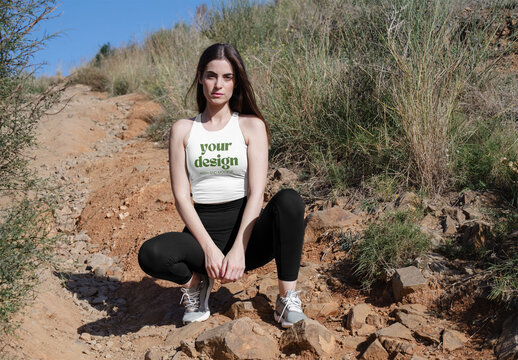 Mockup Of Woman Wearing Customized Sports Top, Crouching