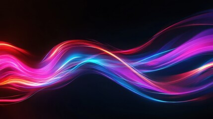 Fototapeta premium Colorful abstract waves of light in vibrant pink, blue, and red hues against a dark background.