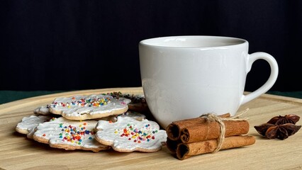 Cup of coffee with homemade Christmas cookies.