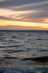 a sunset with clouds and a sunset on the horizon.