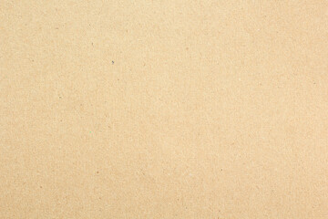 Brown craft cardboard paper sheet of recycle paper background and texture.