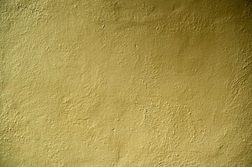 yellow cement grainy texture on the wall