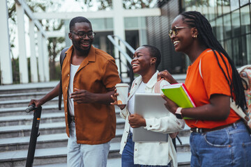 Three Friends Laughing and Enjoying Time Together Outdoors in the City